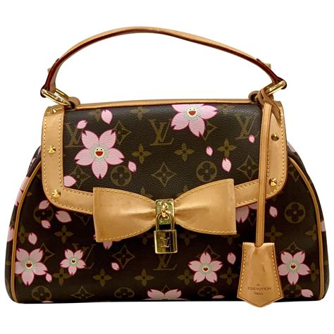 louis vuitton quatrefoil|louis vuitton flower bag.